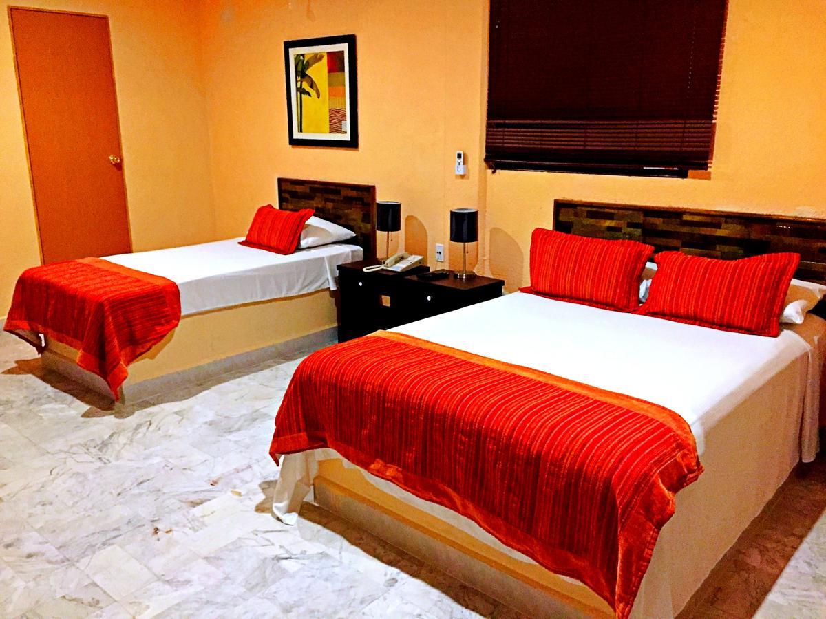 Hotel Versalles Suites Cancún Esterno foto