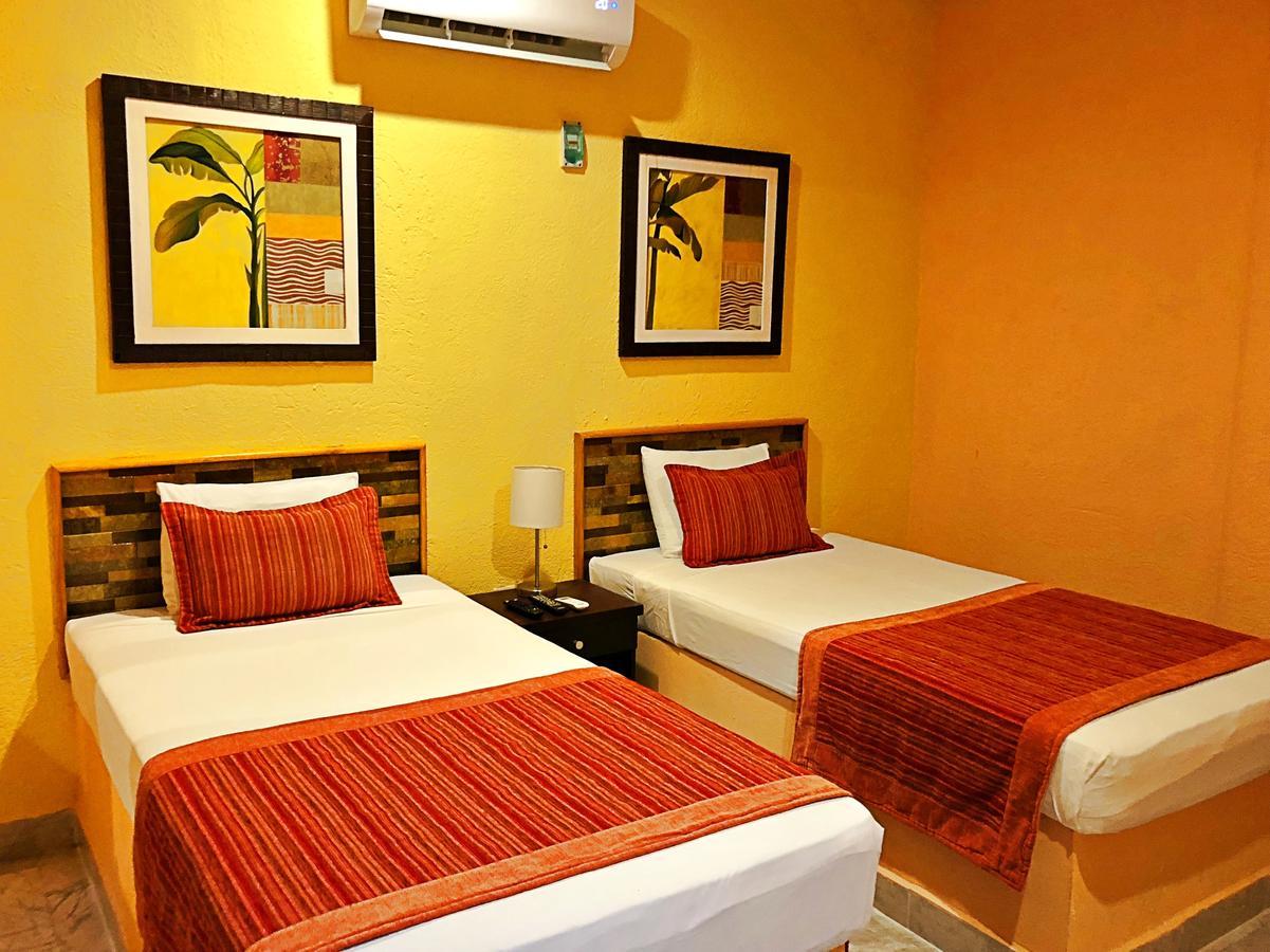 Hotel Versalles Suites Cancún Esterno foto