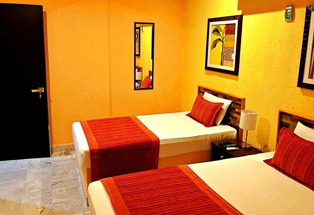 Hotel Versalles Suites Cancún Esterno foto