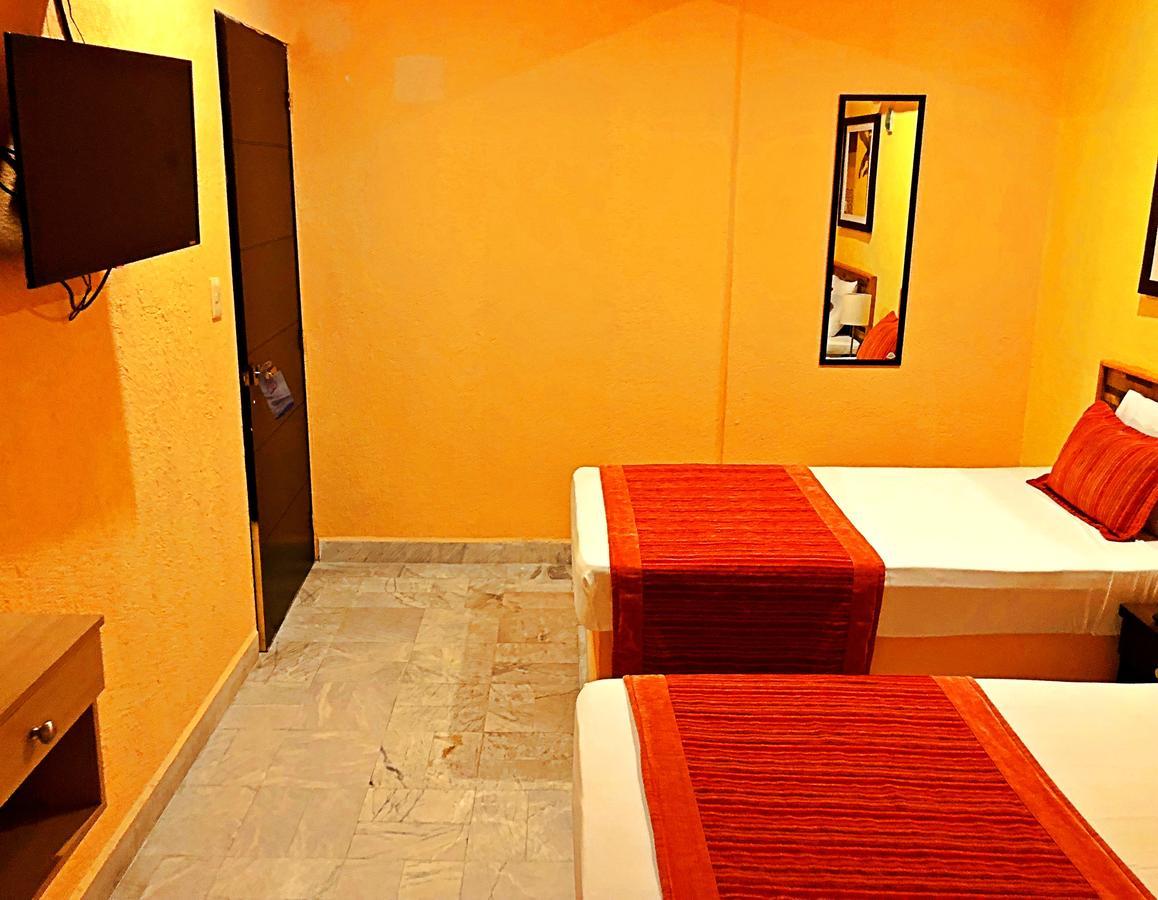 Hotel Versalles Suites Cancún Esterno foto